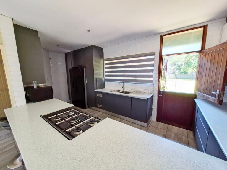 Updated Family Home with huge back yard in Rooihuiskraal